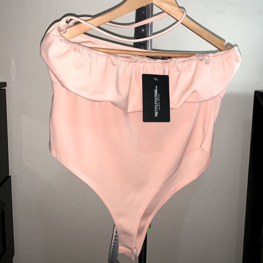 Pretty little thing nude crepe ruched bust cross strap body suit new w/ tag